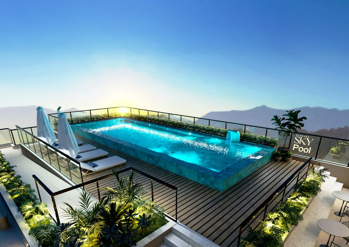 Sky Pool, piscina na cobertura com deck e espreguiçadeiras ao pôr do sol